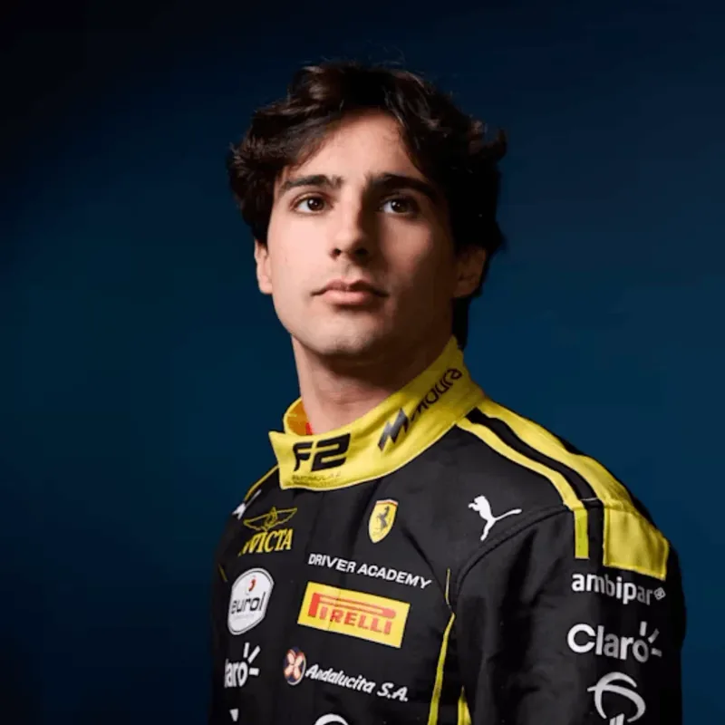 Studio portrait of Rafael Câmara in his Invicta Racing suit